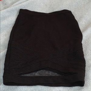 A mini body con skirt